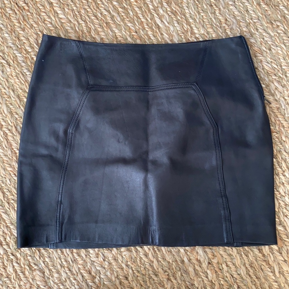 Black leather Diane von Furstenberg mini skirt. Size 6